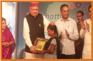felicitated by Dr. Raman Singh